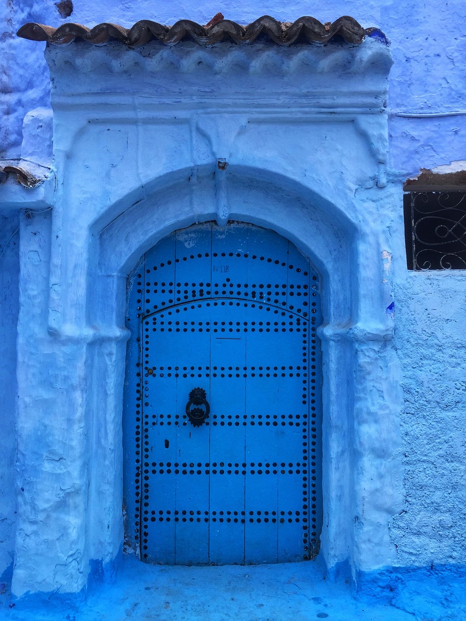 Casablanca to Chefchaouen transfer — traditional blue door in the Blue City medina, Morocco